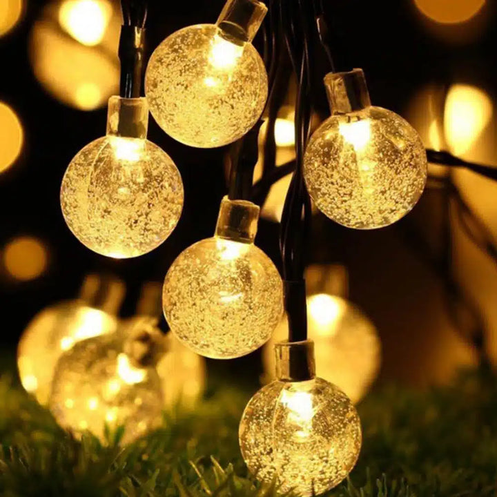 String lights with 30 balls – Charging via solar panel | Stornfield