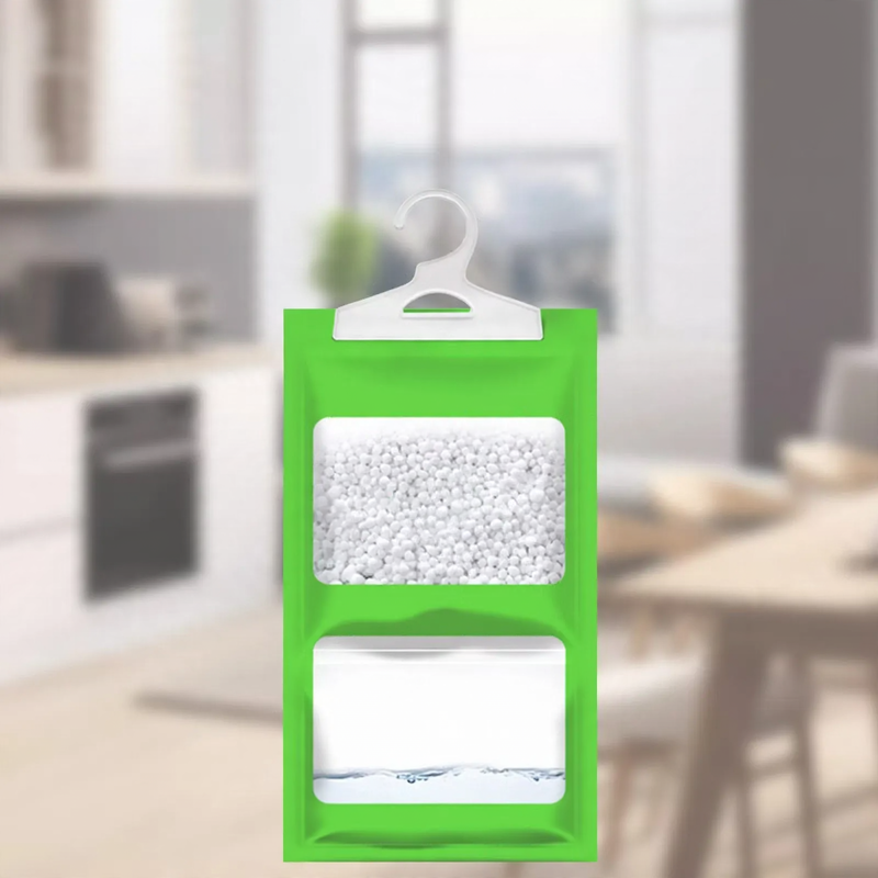 Hanging dehumidifying bag for wardrobes