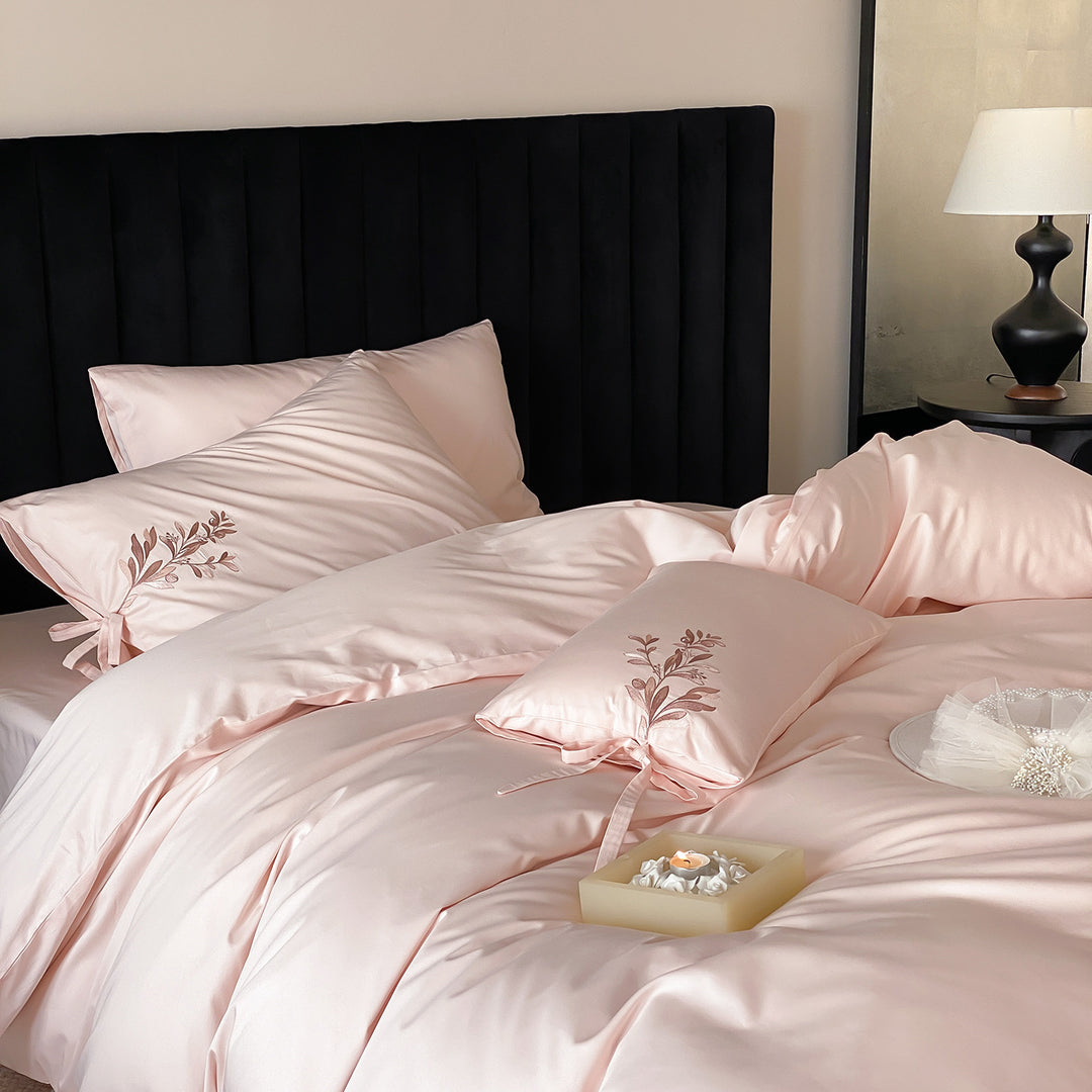 Embroidered cotton bedding with floral design