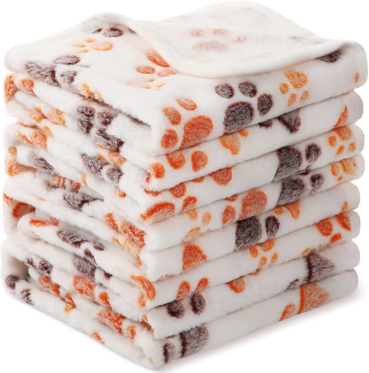 Pet mat made of fleece, paw and bone pattern