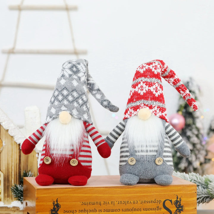 Christmas elf figure with knitted hat, sitting