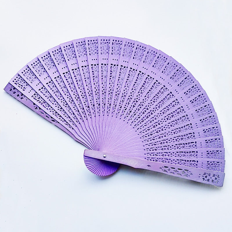 Women's fan made of elegant, intricately perforated material Stornfield