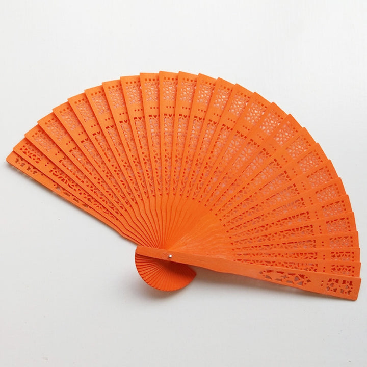 Ladies fan made of delicate plastic with artistic cut pattern Stornfield