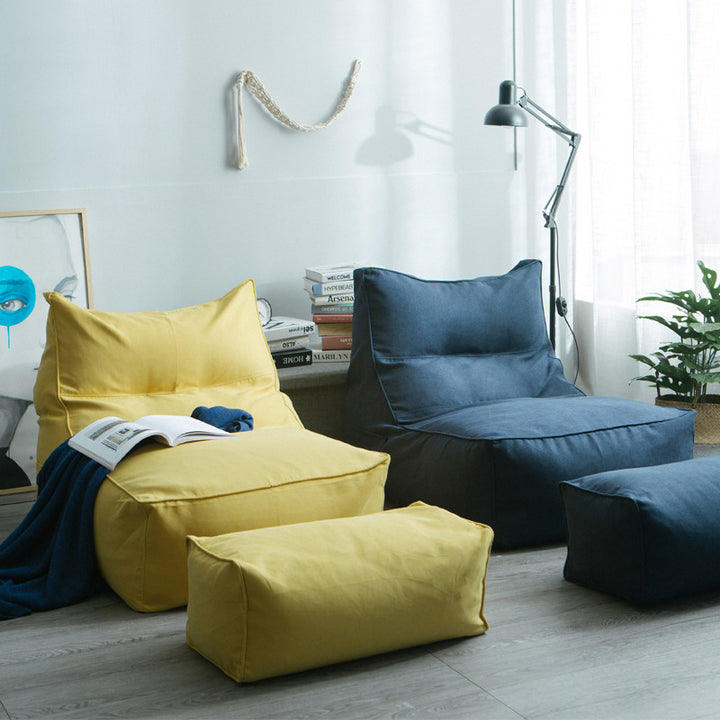 Comfortable lounge bean bag with ergonomic backrest and separate footstool