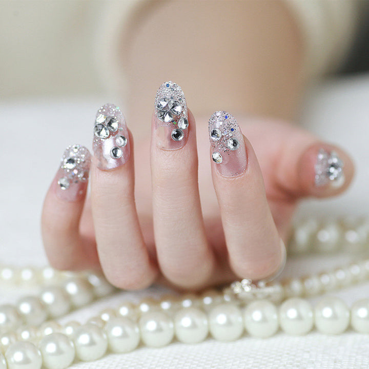 Sparkling artificial nails with rhinestones and sparkling accents Stornfield