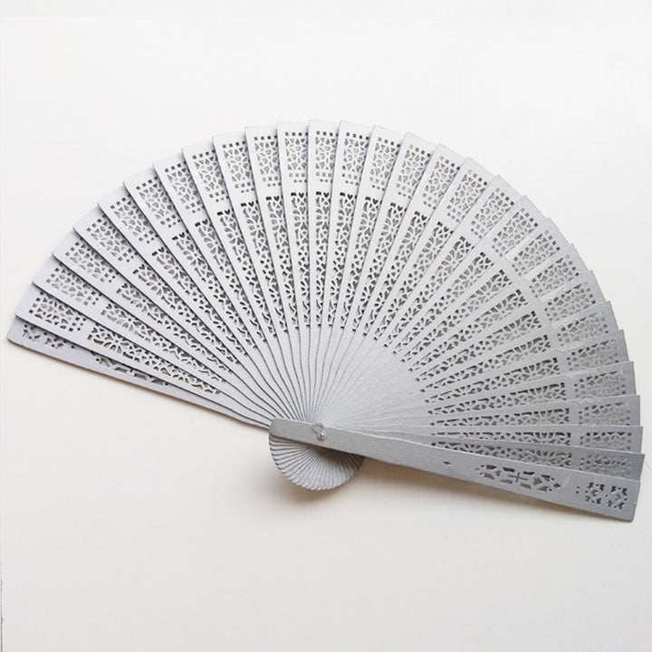Ladies elegant fan made of high-quality plastic with artistic cutouts Stornfield