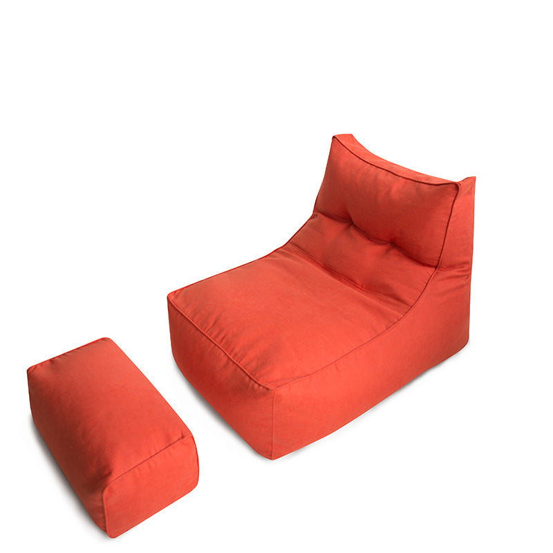 Comfortable lounge bean bag with ergonomic backrest and separate footstool