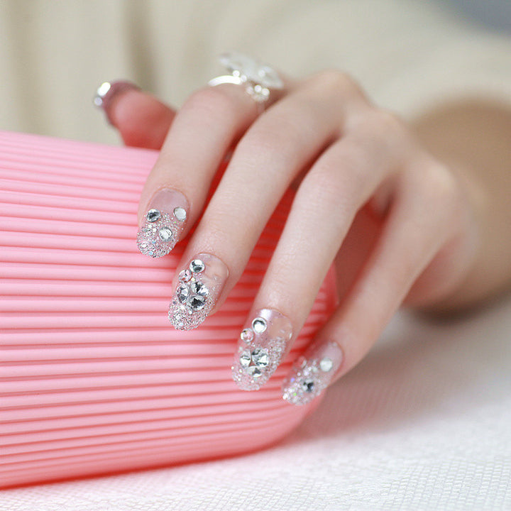 Sparkling artificial nails with rhinestones and sparkling accents Stornfield