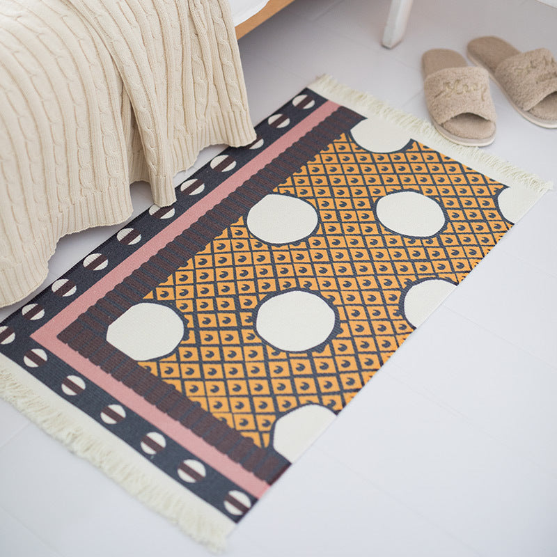 Flat-woven runner rug in ethnic stripe design with hand-fringed edge