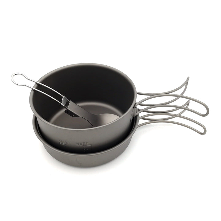 lightweight titanium nesting camping cookware set with folding wire handles Stornfield