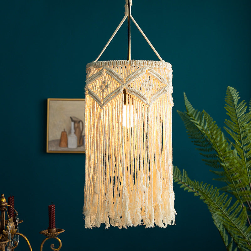 Macramé pendant light with hand-knotted cotton shade and decorative fringes Stornfield