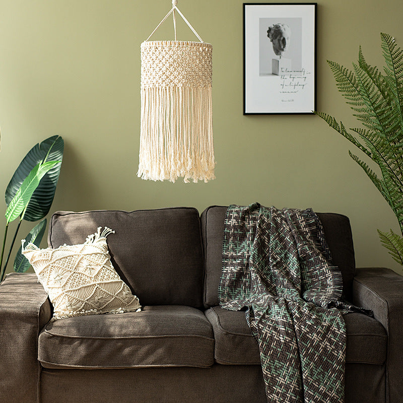 Macramé pendant light with hand-knotted cotton shade and decorative fringes