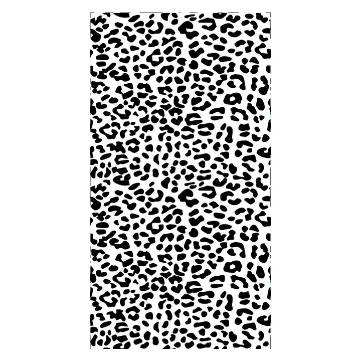 Beach towel with striking leopard motif and colorful accents Stornfield