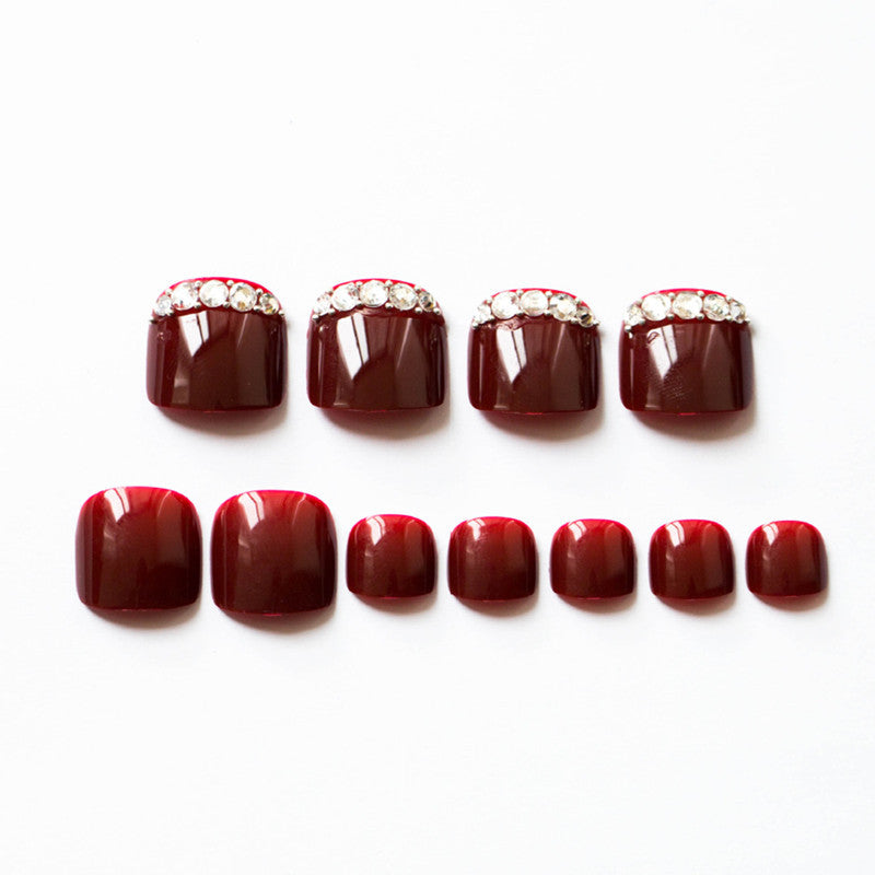 Artful toenails with elegant rhinestone decorations Stornfield