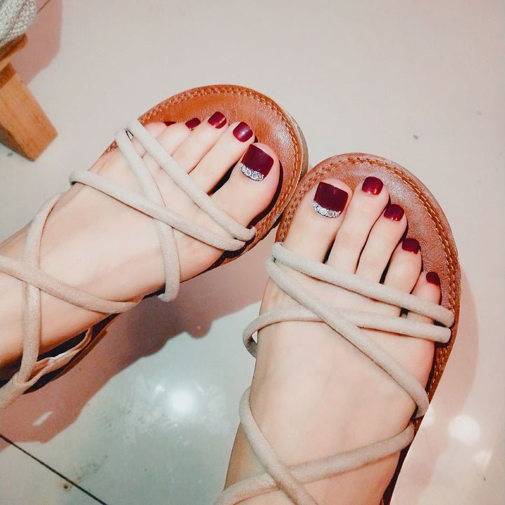 Artful toenails with elegant rhinestone decorations Stornfield