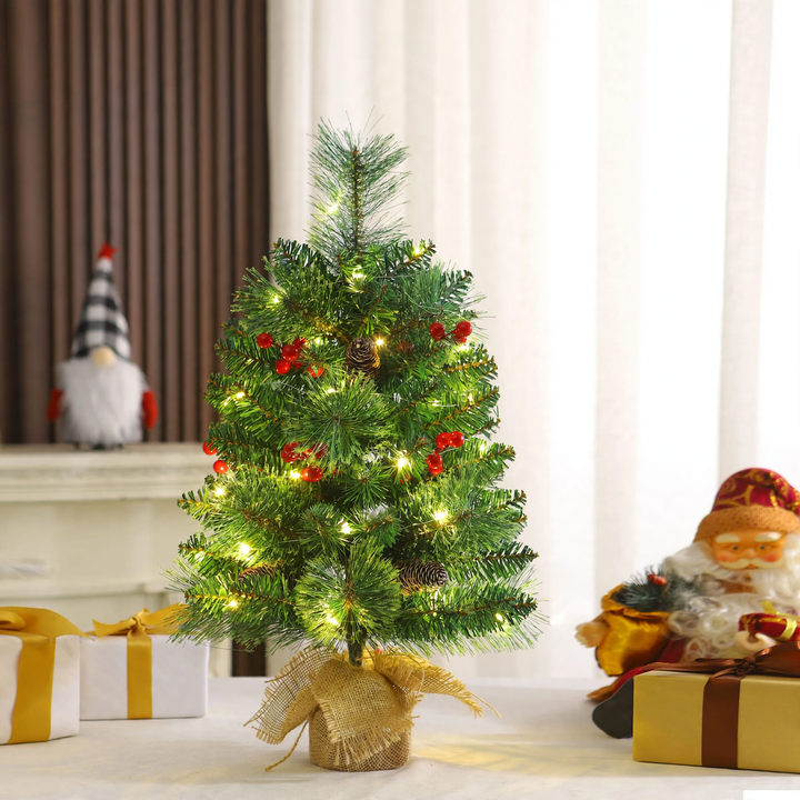 Mini Christmas tree with pine cones and berries