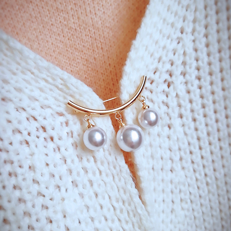 Elegant Pearl Drop Brooch Stornfield