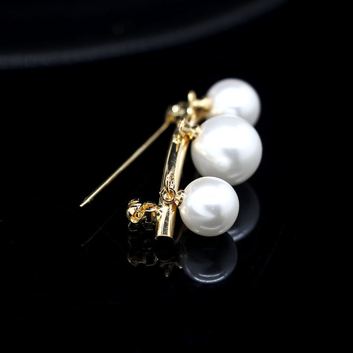 Elegant Pearl Drop Brooch Stornfield