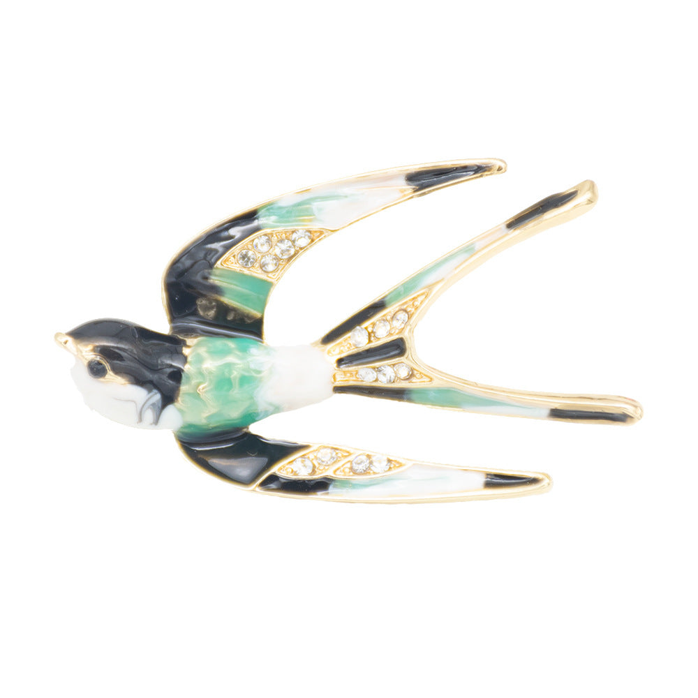 Ornate Bird-Inspired Enamel Brooch Stornfield