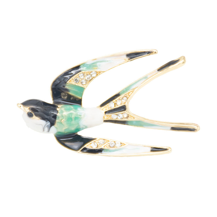 Ornate Bird-Inspired Enamel Brooch Stornfield