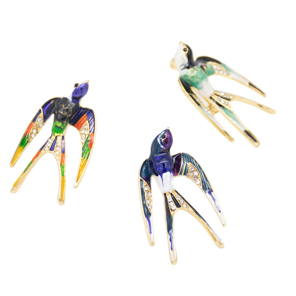 Ornate Bird-Inspired Enamel Brooch Stornfield