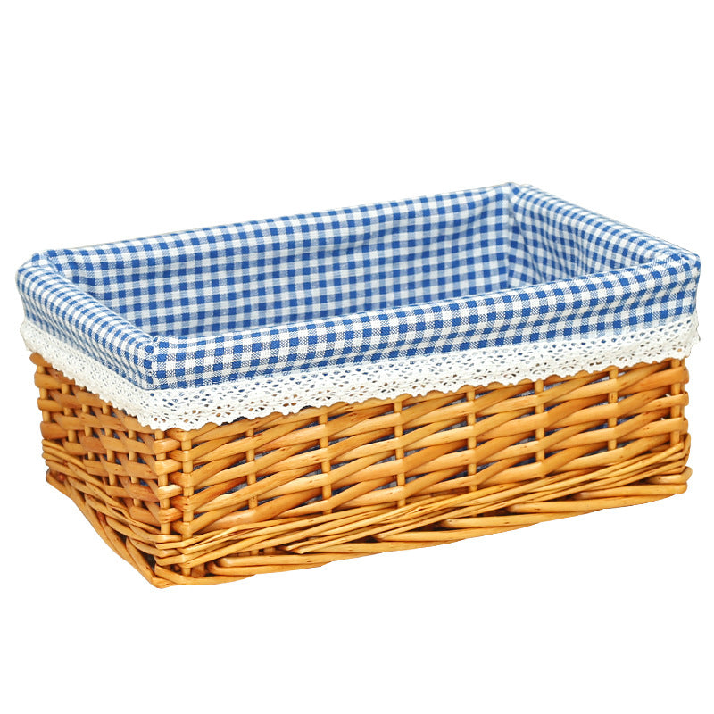 Women's storage basket made of woven natural material with decorative fabric cover Stornfield
