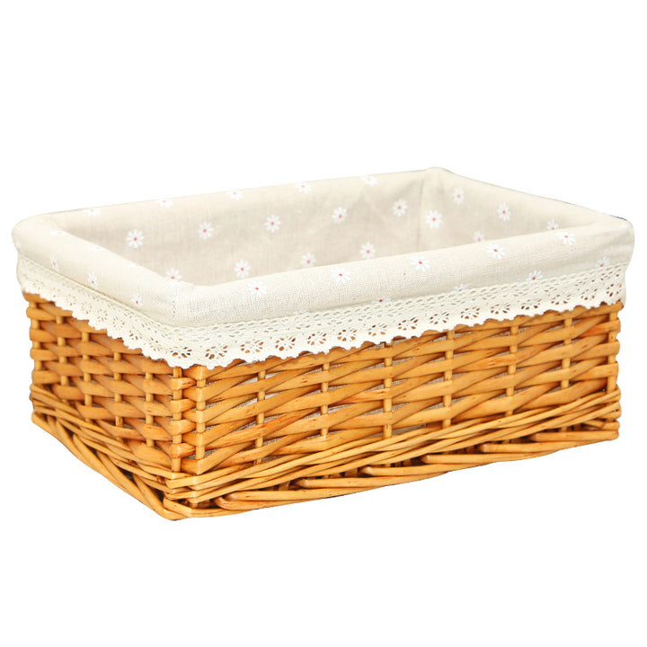 Women's storage basket made of woven natural material with decorative fabric cover Stornfield
