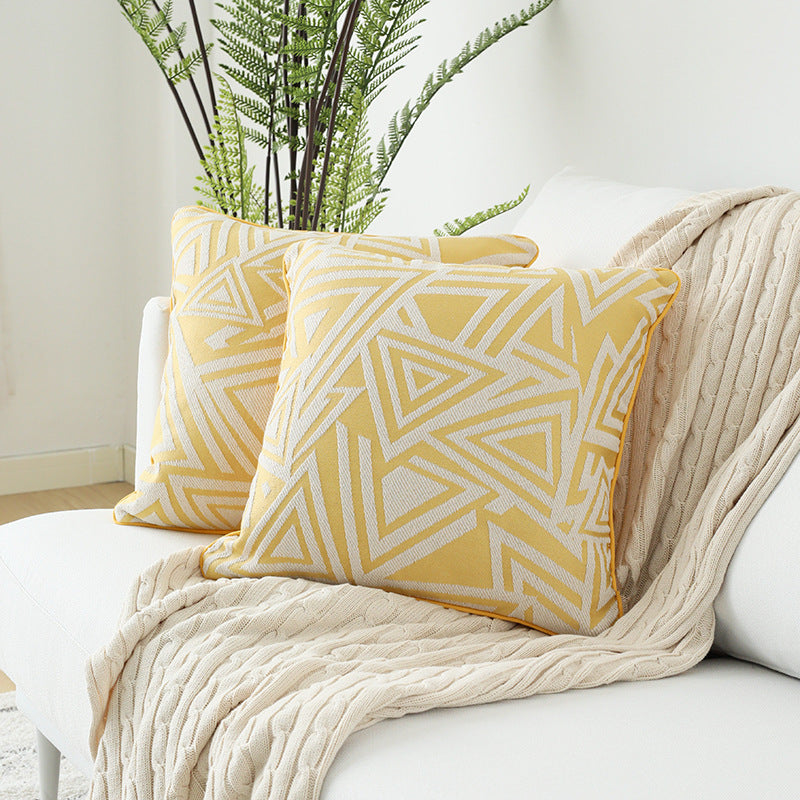 Square cushion cover with double-sided jacquard triangle motif and piping