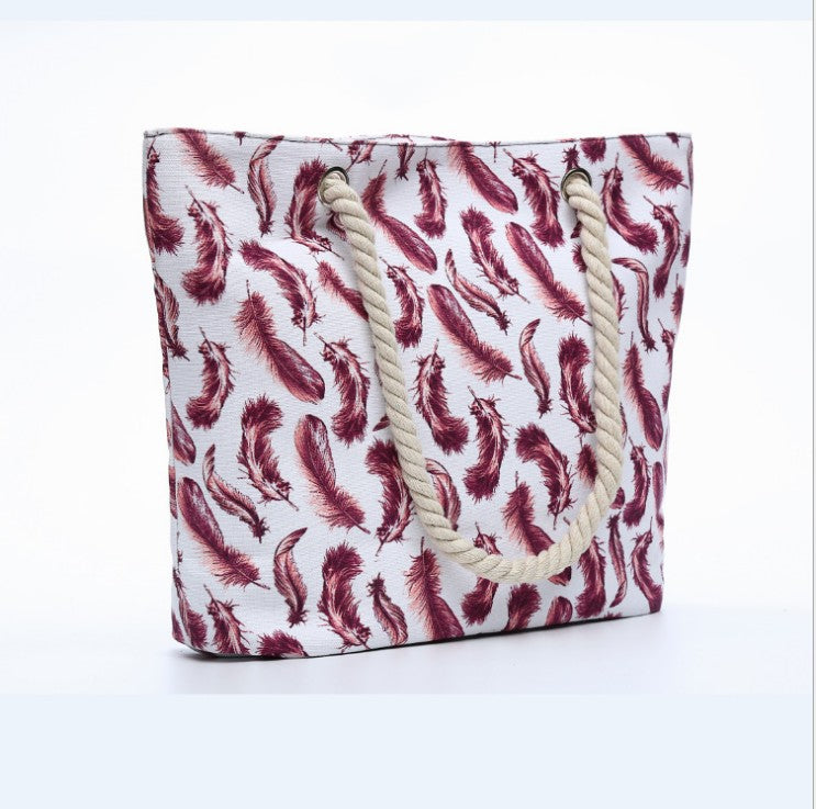 Beach bag with playful feather pattern Stornfield