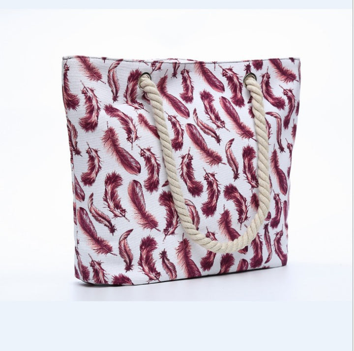 Beach bag with playful feather pattern Stornfield