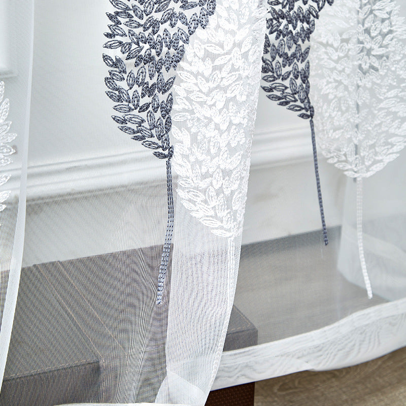 Elegant sheer curtain with leaf pattern