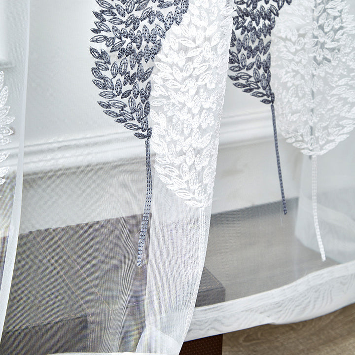 Elegant sheer curtain with leaf pattern