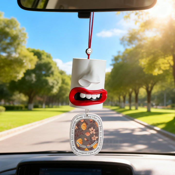 Car fragrance hanger with abstract lip design