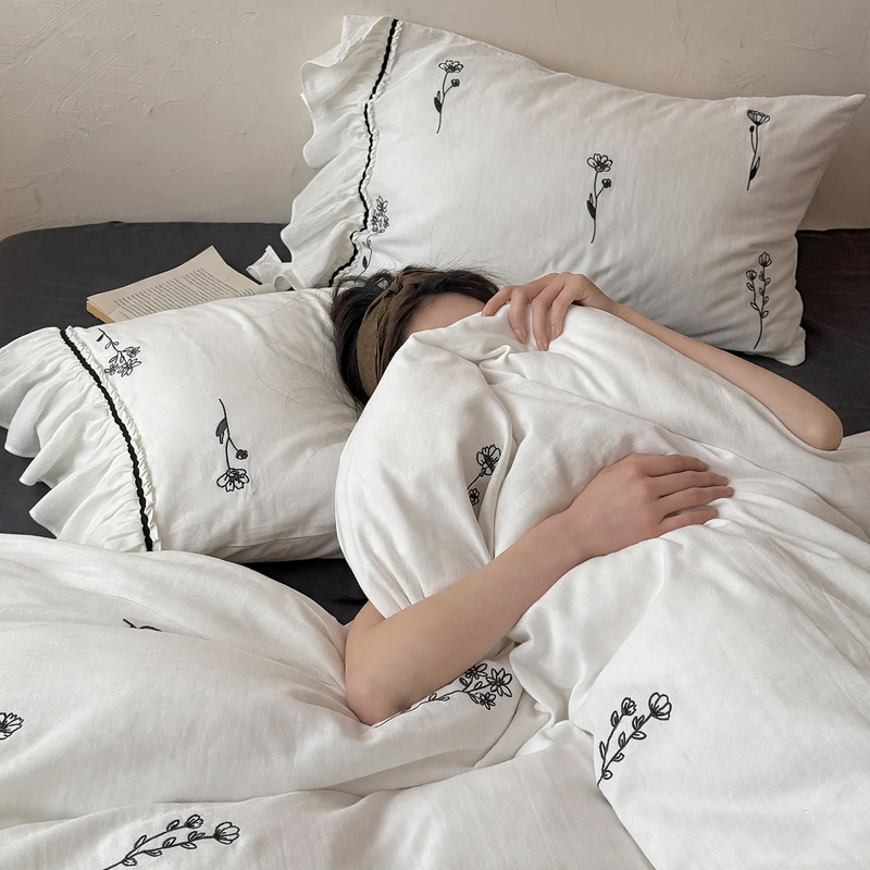 Bedding set made of cotton with floral embroidery and ruffles