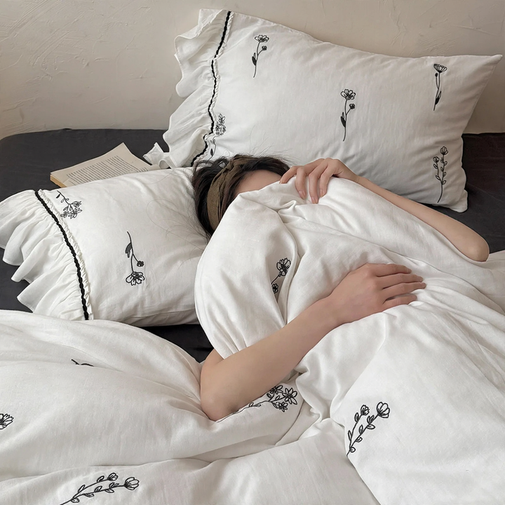 Bedding set made of cotton with floral embroidery and ruffles