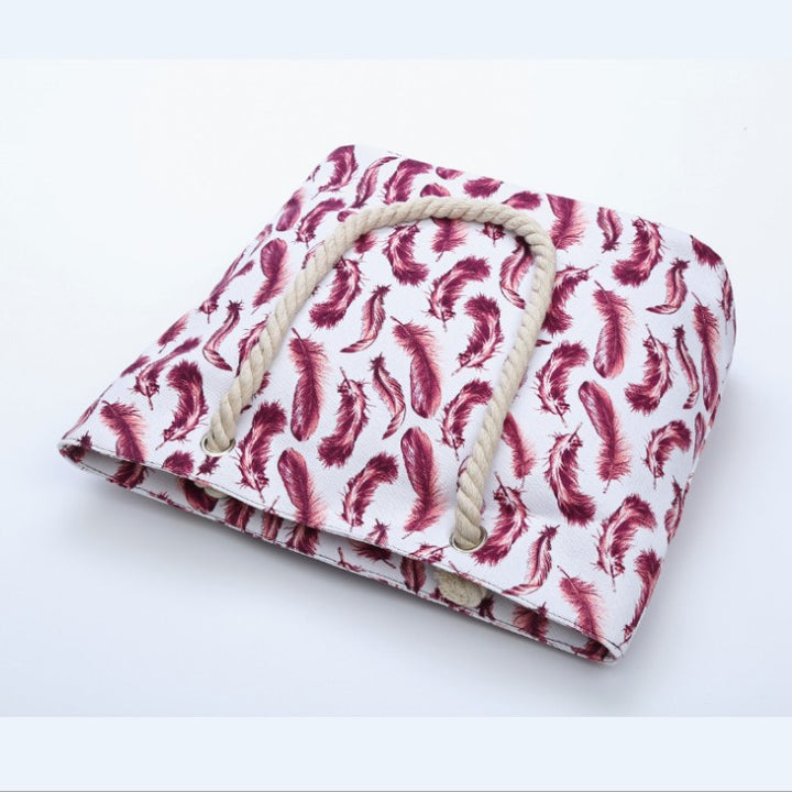 Beach bag with playful feather pattern Stornfield
