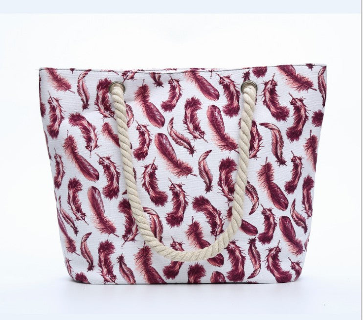 Beach bag with playful feather pattern Stornfield