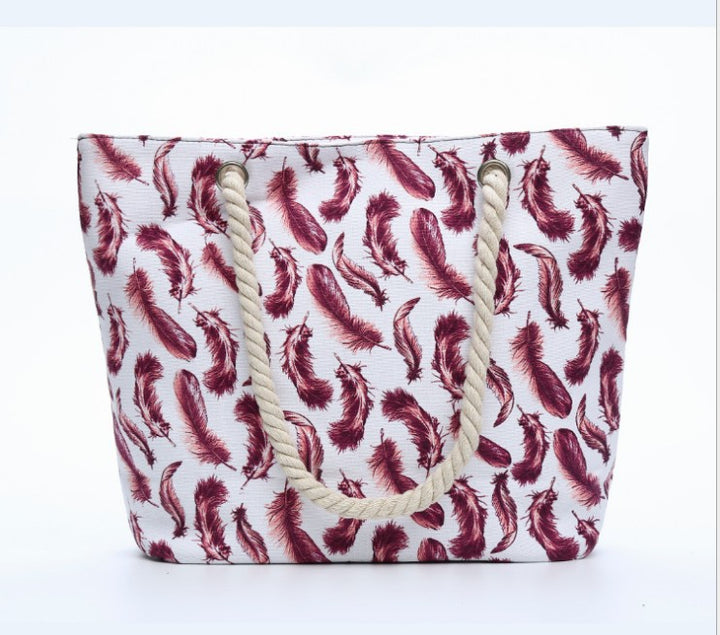 Beach bag with playful feather pattern Stornfield