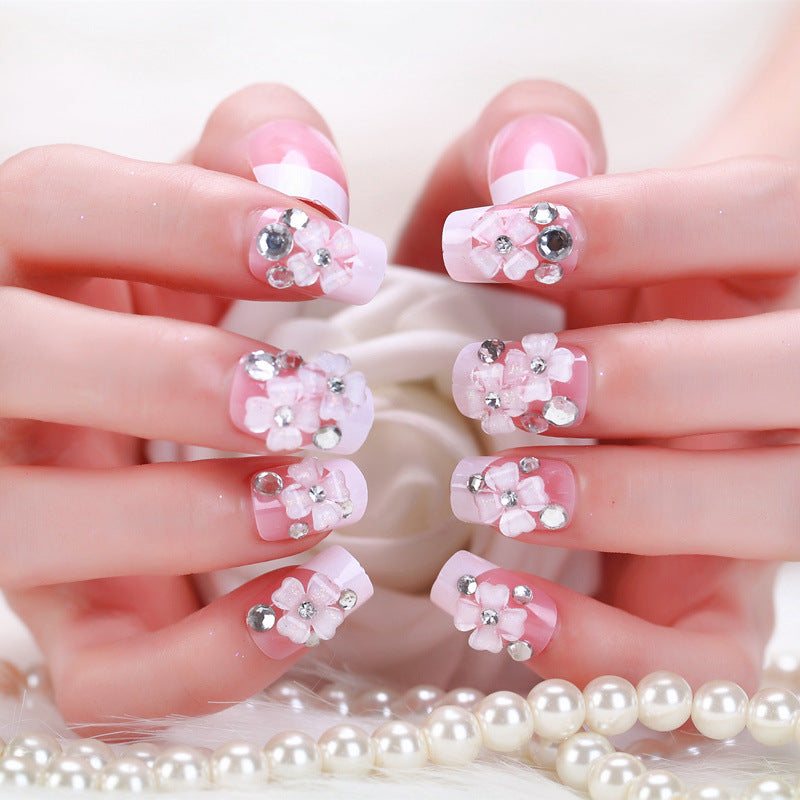 Artificial nails with delicate floral decorations Stornfield