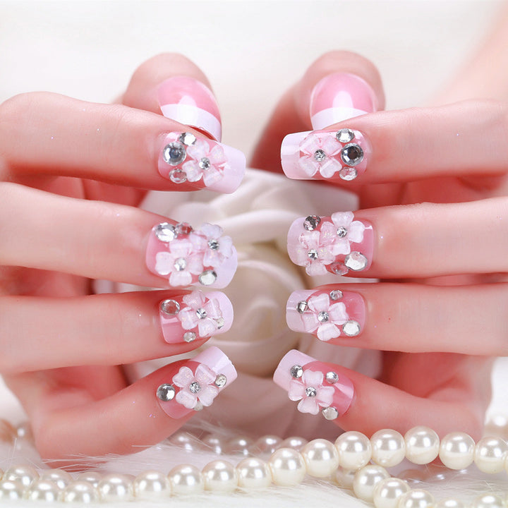 Artificial nails with delicate floral decorations Stornfield