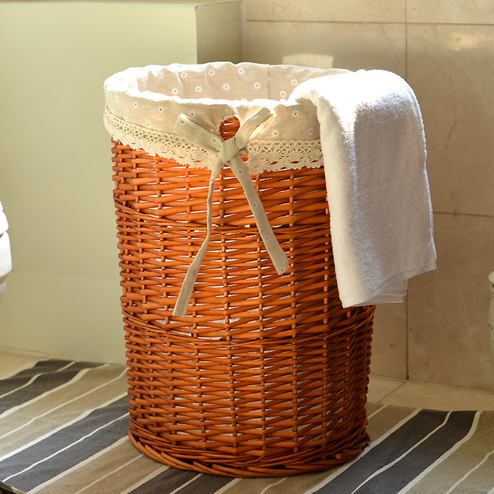 Women's laundry basket made of woven natural material with decorative fabric lining Stornfield