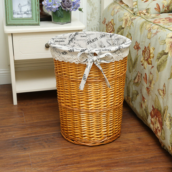 Women's laundry basket made of woven natural material with decorative fabric lining Stornfield
