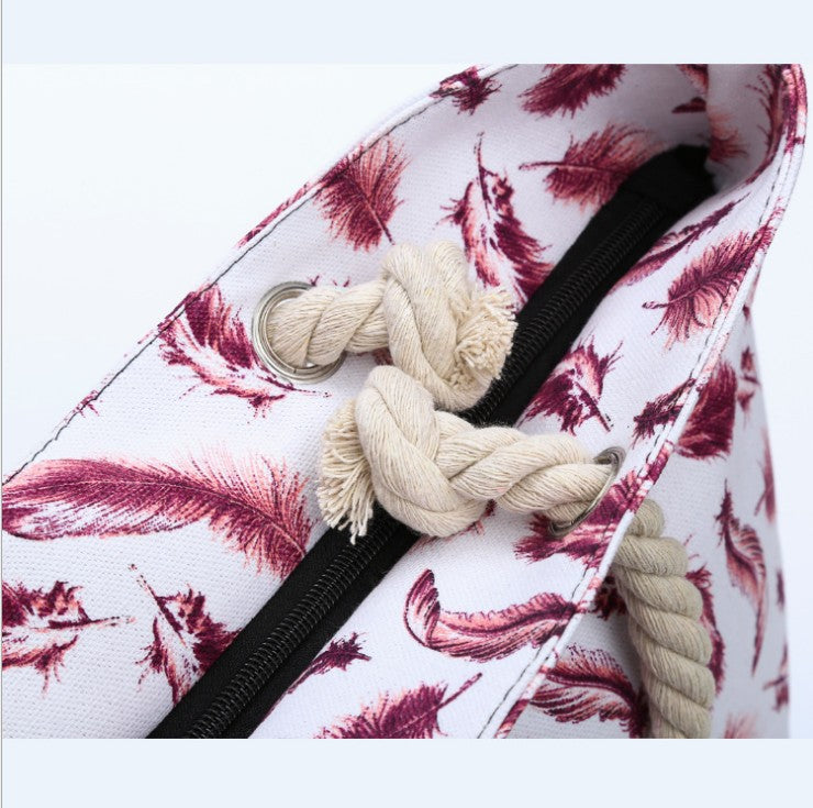 Beach bag with playful feather pattern Stornfield