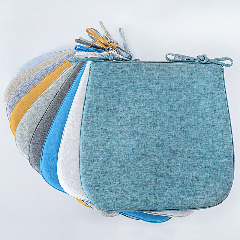 Padded chair cushion with ties in linen look