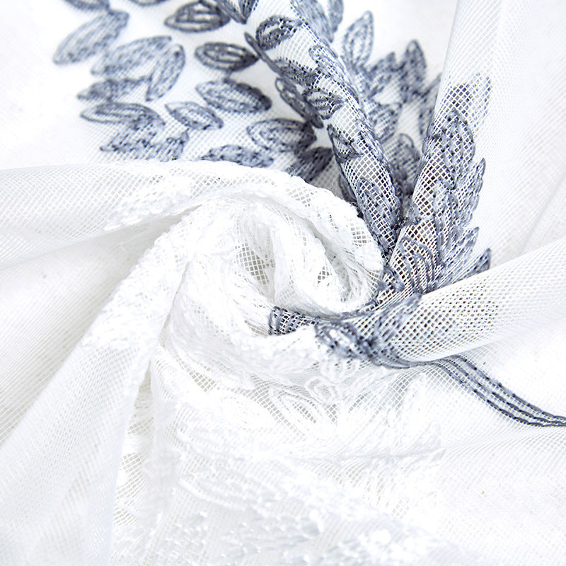 Elegant sheer curtain with leaf pattern