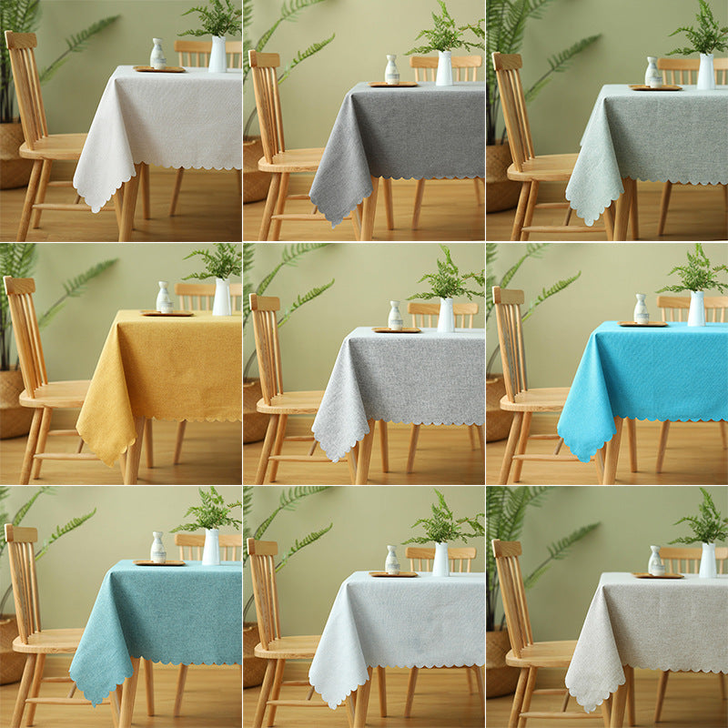 Rectangular tablecloth in linen look with wavy arc edge