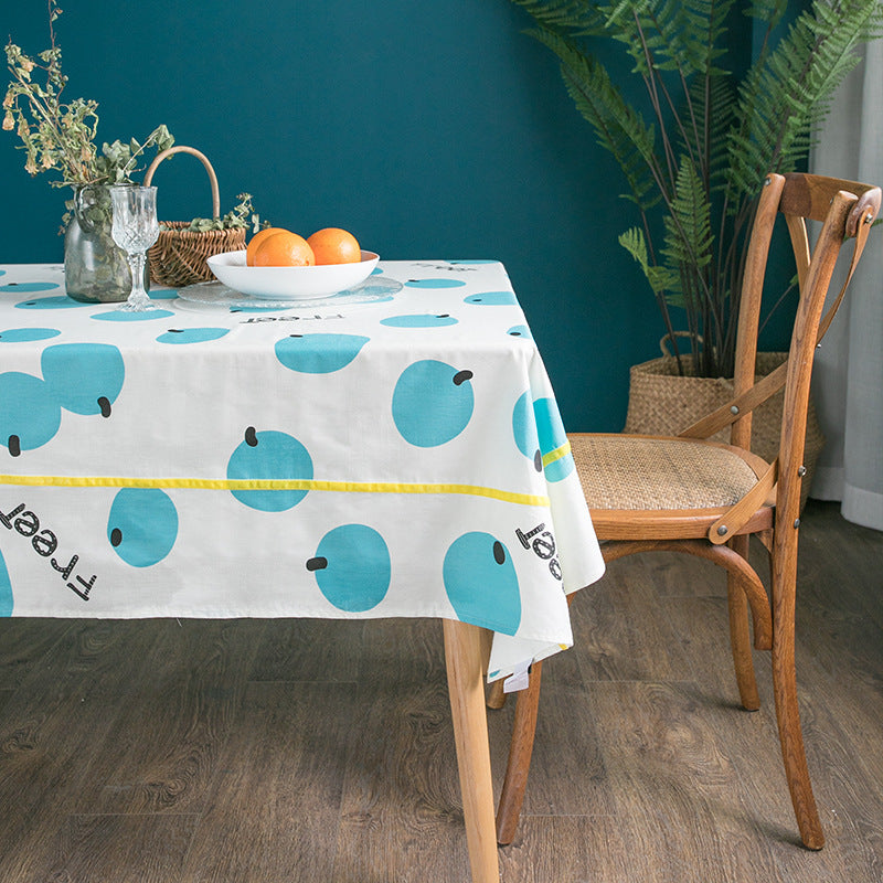 Water-repellent tablecloth with fruity citrus print and easy-care coating