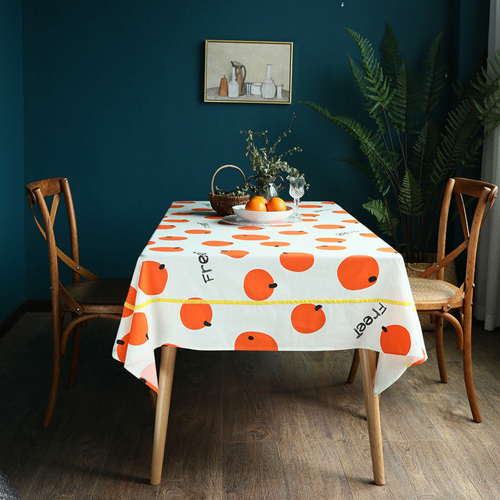 Water-repellent tablecloth with fruity citrus print and easy-care coating