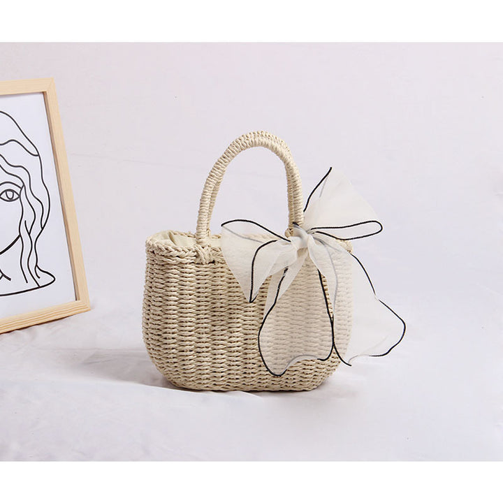 Handcrafted rattan bag with refined details Stornfield