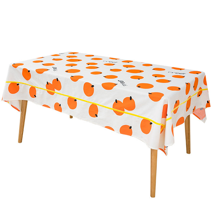 Water-repellent tablecloth with fruity citrus print and easy-care coating